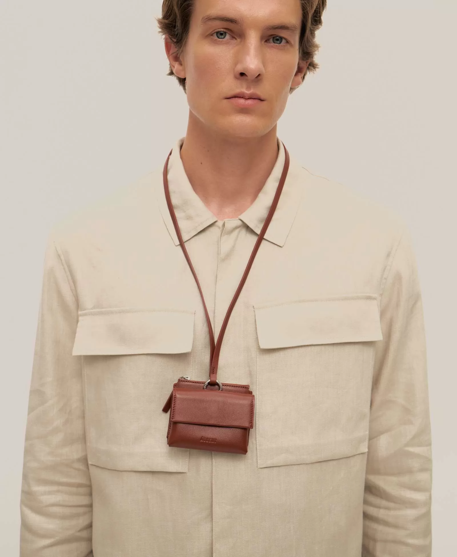 Мини-портмоне на длинном шнуре. Вид 1